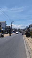Daytime traffic scene captured in Xuân Thành, Vietnam