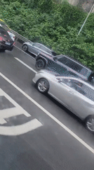 Overturned truck causes traffic delays in Liangjiang, China