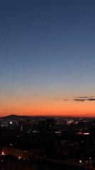 Krasnoyarsk skyline caught mid-transition at dusk