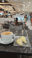 Coffee and durian breakfast captured at Thai cafe
