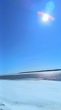 Spring morning documented along frozen river in Nizhnevartovsk, Russia