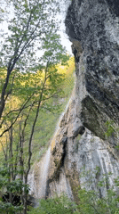 Waterfall documented flowing down rocky cliff in Veselinovo, Bulgaria