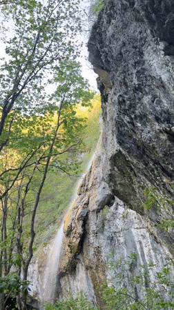 Waterfall documented flowing down rocky cliff in Veselinovo, Bulgaria