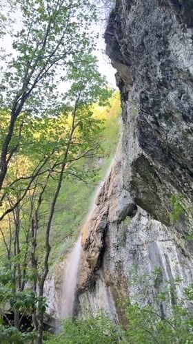 Waterfall documented flowing down rocky cliff in Veselinovo, Bulgaria