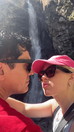 Couple at a waterfall in Tsdo, Georgia