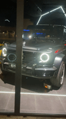 Munich luxury car dealership displays modified Mercedes G-Wagon, sports cars