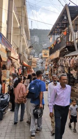 Daily life unfolds around Bhagsu temple complex