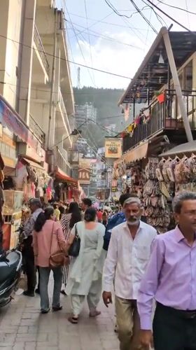 Daily life unfolds around Bhagsu temple complex