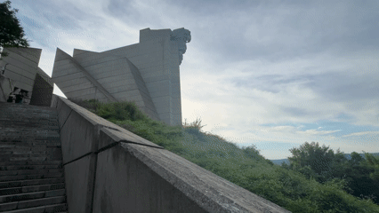 Afternoon visit to concrete war memorial complex with forest paths