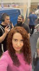 Woman records selfie video in crowded sports venue in Saint Petersburg