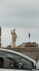 Driver films angel-adorned bridge in Rome