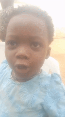 Young child captured in multiple portraits, blue clothing