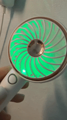 LED fan and lit pumpkin candle, up close in Vitsebsk