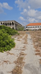 Abandoned ornate buildings documented in deteriorating condition, Cam Ranh