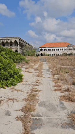 Abandoned ornate buildings documented in deteriorating condition, Cam Ranh