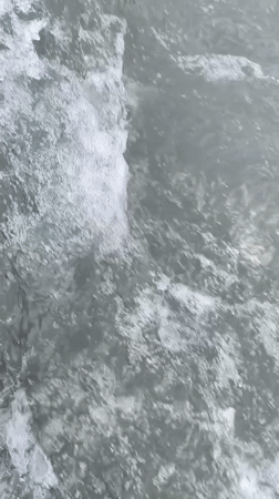 White water rapids cutting through a Kyrgyz valley
