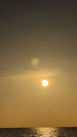 Golden hour on Ko Samui, words written in the sand
