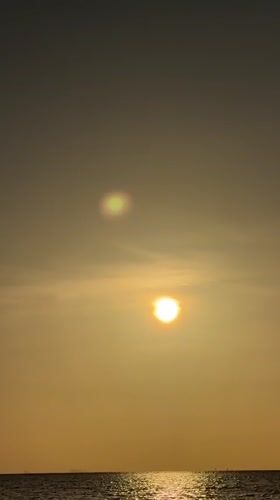 Golden hour on Ko Samui, words written in the sand