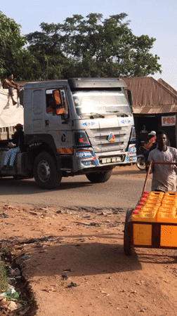 Morning street life documented across Abuja commercial districts