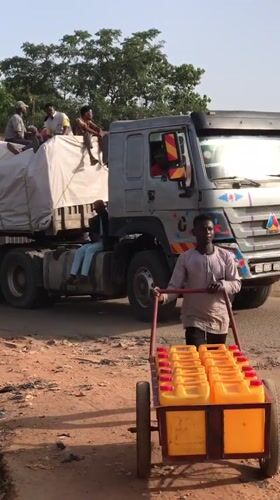 Morning street life documented across Abuja commercial districts