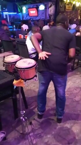Night out in Lokoja: live drums, a DJ, and a crowd