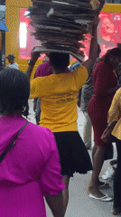 Busy Market Activity Documented in Fegge, Nigeria During Evening Hours