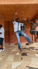 Young men perform coordinated dance routine in Nigeria