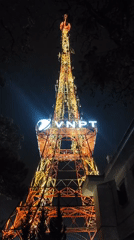 Illuminated telecom towers documented in Da Lat Vietnam nighttime