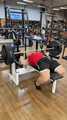 Man performs bench press workout at Chaikovsky gym