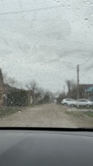 Rainy weather driving conditions documented in Kurganinsk, Russia