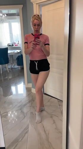 Woman takes bathroom mirror selfies in Sinyavino, Russia
