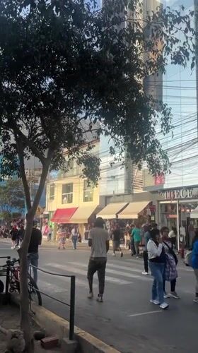 Evening street life captured in La Victoria, Peru