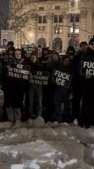 Nighttime protest in snowy NYC demands justice, criticizes ICE