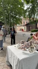 Town square gathering features graduates, hula hoops, robot dog