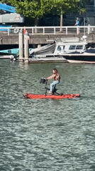 Vancouver waterfront buzzes with recreational boating activities on sunny day
