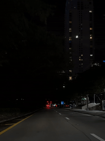 Late night drive through Miami streets ends at bar