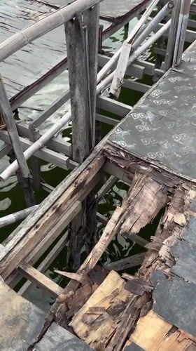 Damaged wooden pier documented in Baan Chaweng Thailand