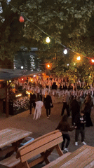 Evening outdoor gathering observed in Berlin event space