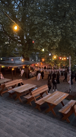 Evening outdoor gathering observed in Berlin event space