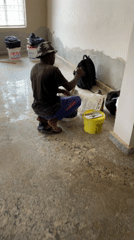 Construction crew renovates interior space in Jos, Nigeria