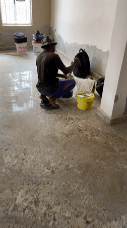 Construction crew renovates interior space in Jos, Nigeria
