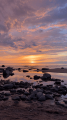 Golden sunset captured along Ķurmrags beach in Latvia