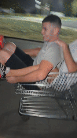 Shopping cart ride in a Kazanlak parking lot at night