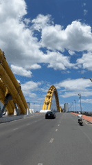 Vehicle journey across Dragon Bridge captured in Đà Nẵng