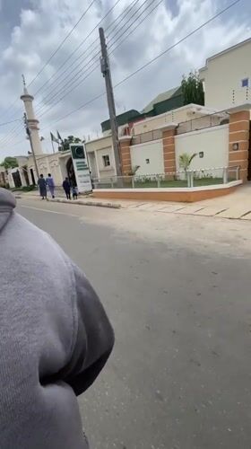 Person films from moving vehicle near mosque in Kaduna