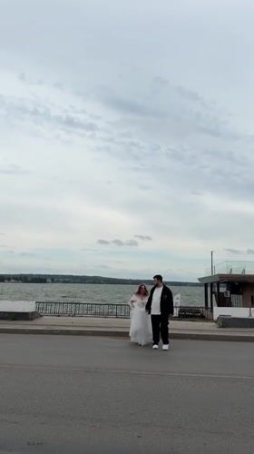 Wedding photo session along Votkinsk waterfront archways