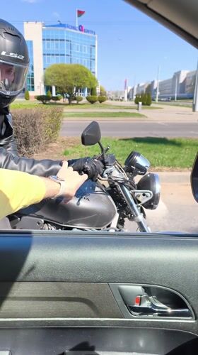 Motorcyclist in black leather observed riding Honda in Hrodna