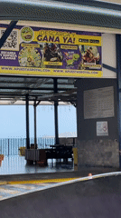 Vehicle journey through Puerto La Cruz captures religious, civic scenes