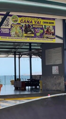 Vehicle journey through Puerto La Cruz captures religious, civic scenes