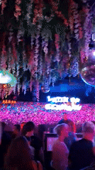 Busy Mainz nightclub, disco balls and neon on a Friday night